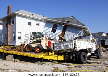 FAR ROCKAWAY, NY - NOVEMBER 11: Destroyed beach houses in the aftermath of Hurricane Sandy on November 11, 2012 in Far Rockaway, NY