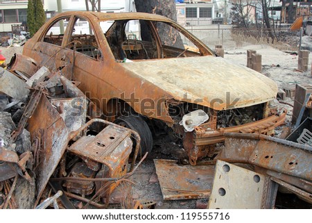 BREEZY POINT, NY - NOVEMBER 20: Burned car in the aftermath of Hurricane Sandy on November 20, 2012 in Breezy Point, NY