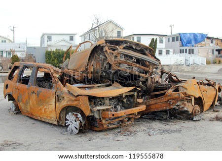 BREEZY POINT, NY - NOVEMBER 20: Burned cars in the aftermath of Hurricane Sandy on November 20, 2012 in Breezy Point, NY