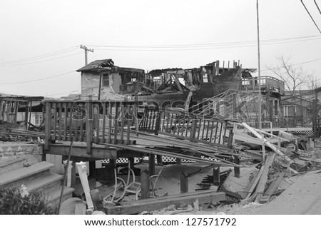 BREEZY POINT, NY- FEBRUARY 7:Hurricane devastated area in Breezy Point,NY three months after Hurricane Sandy on February 7, 2013. More than 80 houses were destroyed in out-of-control six-alarm blaze.