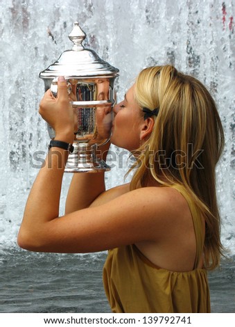 NEW YORK - SEPTEMBER 10: US Open 2006 champion Maria Sharapova kisses US Open trophy after her win the ladies singles final  on September 10, 2006 in Flushing, New York