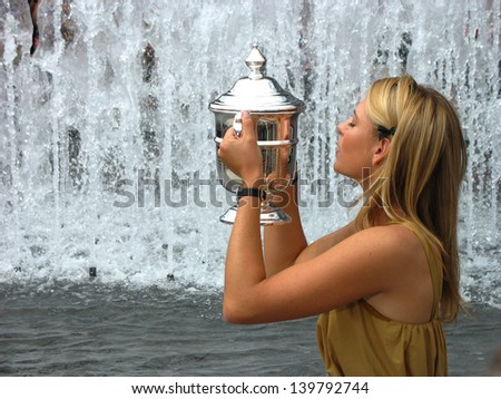 NEW YORK - SEPTEMBER 10: US Open 2006 champion Maria Sharapova holds US Open trophy after her win the ladies singles final  on September 10, 2006 in Flushing, New York