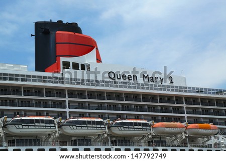 NEW YORK CITY - JULY 27: Queen Mary 2 cruise ship detail at Brooklyn Cruise Terminal on July 27, 2013. Queen Mary 2 is CunardÃ¢Â?Â?s flagship ready for Transatlantic Crossing  from New York to  Southampton