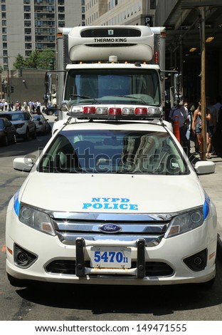 NEW YORK - AUGUST 6: NYPD on high alert after terror threat in New York City on August 6, 2013. Numerous NYPD cars providing security in World Trade Center area of Manhattan