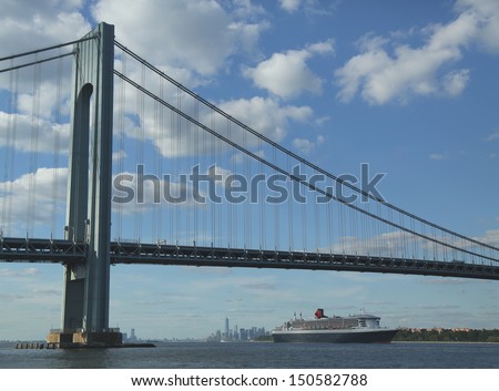 NEW YORK CITY - AUGUST 15: Queen Mary 2 cruise ship in New York Harbor under Verrazano Bridge heading for Transatlantic Crossing from New York to Southampton on August 15, 2013