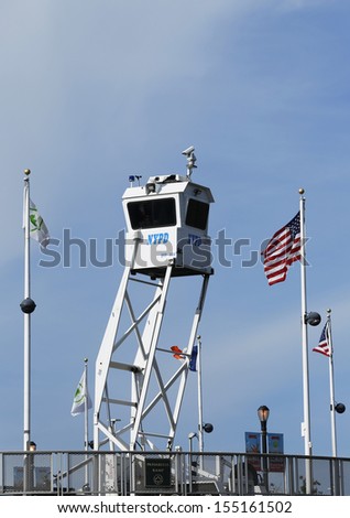 FLUSHING, NY- SEPTEMBER 9: NYPD Sky Watch platform placed near National Tennis Center on September 9, 2013 in Flushing. SkyWatch platform provides flexible surveillance options for high level security