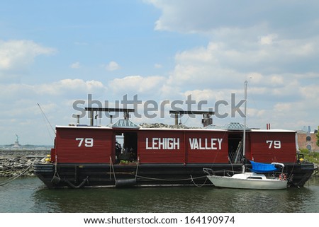 BROOKLYN, NY - AUGUST 17: The Lehigh Valley Railroad Barge Number 79 in Brooklyn on August 17, 2013. It is only surviving all-wooden example of the Hudson River Railroad Barge that remains afloat.