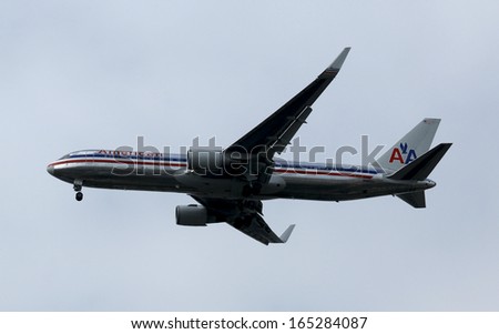 NEW YORK - OCTOBER 17: American Airlines Boeing 767 in New York sky before landing at JFK Airport on October 17, 2013. In 2013 the American Airlines fleet consists of 621 aircraft