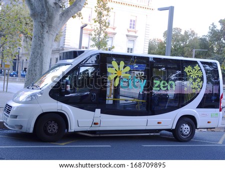 AVIGNON, FRANCE - OCTOBER 11: New shuttle bus Cutyzen in medieval part of Avignon on October 11, 2013. Cutyzen offers new ecological shuttles in old part of Avignon and reduce noise and pollution.