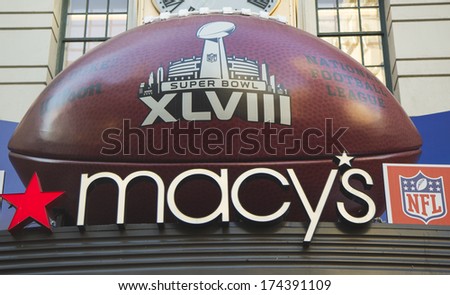 NEW YORK - JANUARY 30: Giant Football at Macy\'s Herald Square on Broadway during Super Bowl XLVIII week in Manhattan on January 30, 2014. Macy\'s Herald Square is an official NFL shop at Super Bowl