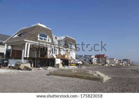 FAR ROCKAWAY, NY - NOVEMBER 11: Destroyed beach houses in the aftermath of Hurricane Sandy on November 11, 2012 in Far Rockaway, NY. Image taken 12 days after Superstorm Sandy hit New York