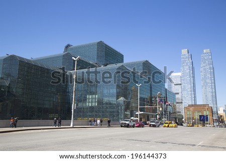 NEW YORK - APRIL 24: Javits Convention Center in Manhattan on April 24, 2014. The convention center has a total area space of 1,800, 000 square ft and has 840,000 square ft of total exhibit space