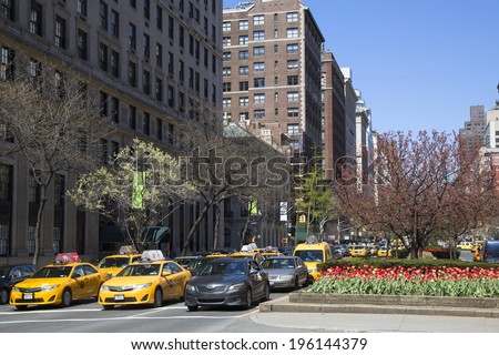 NEW YORK - APRIL 24: Spring flowers blooming at Park Avenue in Manhattan on April 24, 2014 Park Avenue is a wide boulevard that carries traffic in the New York City borough of Manhattan