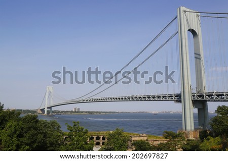 NEW YORK - JULY 1:Verrazano Bridge in New York on July 1, 2014. The Verrazano Bridge is a double-decked suspension bridge that connects the boroughs of Staten Island and Brooklyn in New York City
