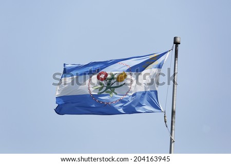 NEW YORK - JULY 8 The Borough of Queens official flag in New York on July 8, 2014. Queens is the easternmost and largest in area of the five boroughs of New York City