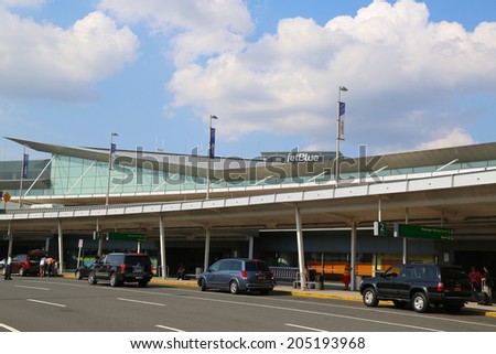 NEW YORK- JULY 10: JetBlue Terminal 5 at John F Kennedy International Airport in New York on July 10, 2014. JFK is one of the biggest  airports in the world with 4 runways and 8 terminals