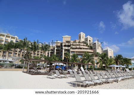 GRAND CAYMAN - JUNE 11: The Ritz-Carlton Grand Cayman luxury resort located on the Seven Miles Beach on June 11, 2014. Seven Mile Beach is the most populated area for hotels and resorts on the island
