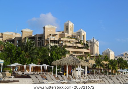 GRAND CAYMAN - JUNE 11: The Ritz-Carlton Grand Cayman luxury resort located on the Seven Miles Beach on June 11, 2014. Seven Mile Beach is the most populated area for hotels and resorts on the island