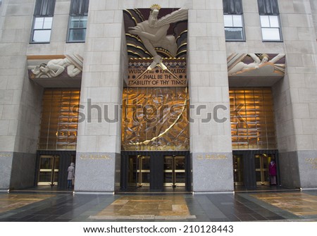 NEW YORK CITY - JANUARY 26: Wisdom, an art deco frieze by Lee Lawrie over the entrance of GE Building at Rockefeller plaza on January 26, 2014