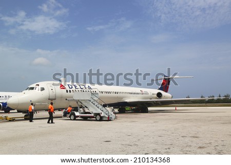 GRAND CAYMAN, CAYMAN ISLANDS - June 13  Delta Airlines McDonnell Douglas MD-80  at Owen Roberts International Airport at Grand Cayman on June 13, 2014