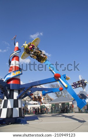 BROOKLYN, NY - MAY 17: Air race on May 17, 2014 in Coney Island Luna Park.Riders pilot their own planes around a \