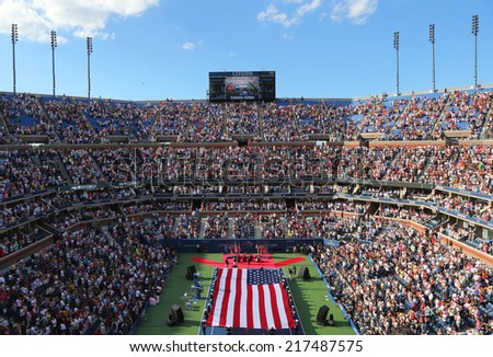 NEW YORK- SEPTEMBER 7  US Marine Corps unfurling American Flag  during the opening ceremony of the US Open 2014 women final at Billie Jean King National Tennis Center on September 7, 2014 in New York