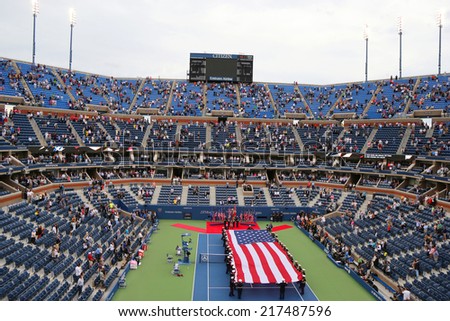 NEW YORK- SEPTEMBER 8  US Marine Corps unfurling American Flag  during the opening ceremony of the US Open 2014 men final at Billie Jean King National Tennis Center on September 8, 2014 in New York