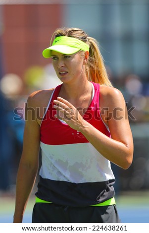 NEW YORK - AUGUST 28: Five times Grand Slam champion Maria Sharapova practices for US Open 2014 at Arthur Ashe Stadium on August 28, 2014 in New York