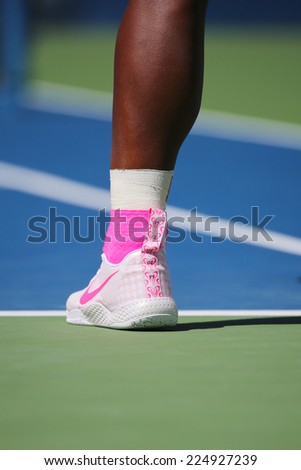NEW YORK - AUGUST 28 Seventeen times Grand Slam champion Serena Williams wears custom Nike tennis shoes during match at US Open 2014 at Billie Jean King National Tennis Center on August 28, 2014 in NY