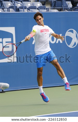 NEW YORK - AUGUST 21: Seventeen times Grand Slam champion Roger Federer practices for US Open 2014 at Billie Jean King National Tennis Center on August 21, 2014 in New York
