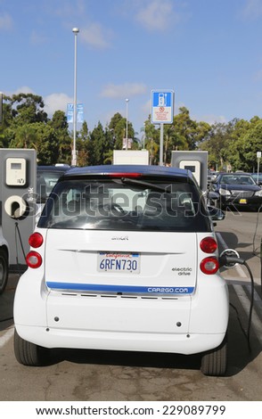 SAN DIEGO, CALIFORNIA - SEPTEMBER 28 Car2go car parked at Electric Car charging station and ready to hire at Balboa Park in San Diego on September 28, 2014