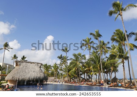 PUNTA CANA, DOMINICAN REPUBLIC - JANUARY 1, 2015: Pool bar at  Royalton All-inclusive Resort and Casino located at the Bavaro beach in Punta Cana