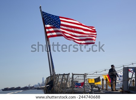 NEW YORK - MAY 25, 2014:  American flag at the USS McFaul guided missile destroyer of the United States Navy during Fleet Week 2014 in New York