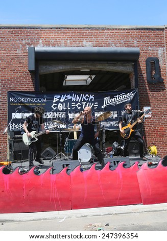 NEW YORK - JUNE 1, 2014: Rock Band performing at Annual Bushwick Collective Jam Block Party at East Williamsburg in Brooklyn