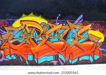 NEW YORK - JULY 24, 2014: Graffiti art at East Williamsburg in Brooklyn. Outdoor art gallery known as the Bushwick Collective has most diverse collection of street art in Brooklyn