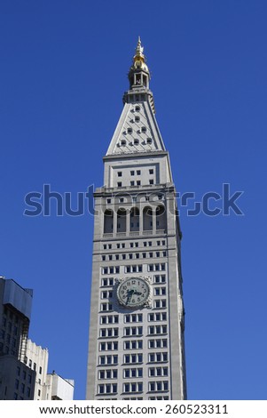 NEW YORK - MARCH 12, 2015: Met Life Tower with iconic clock in Flatiron district in Manhattan. Clock face is 26.5 feet (8 m) in diameter with each number being four feet (1.2 m) tall