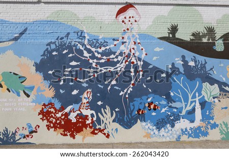 NEW YORK - MARCH 19, 2015: Mural art at Coney Island in Brooklyn. A mural is any piece of artwork painted or applied directly on a wall, ceiling or other large permanent surface