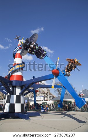 BROOKLYN, NEW YORK - MAY 17, 2014: Air race in Coney Island Luna Park.Riders pilot their own planes around a \