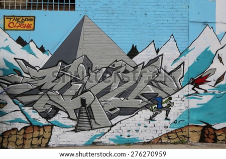 NEW YORK - MAY 5, 2015: Mural art at East Williamsburg in Brooklyn. Outdoor art gallery known as the Bushwick Collective has most diverse collection of street art in Brooklyn