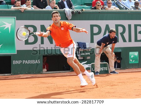 PARIS, FRANCE- MAY 28, 2015: Eight times Grand Slam champion Novak Djokovic during second round match at Roland Garros 2015 in Paris, France