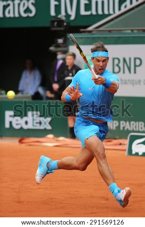 PARIS, FRANCE- MAY 26, 2015:Fourteen times Grand Slam champion Rafael Nadal in action during his first round match at Roland Garros 2015 in Paris, France