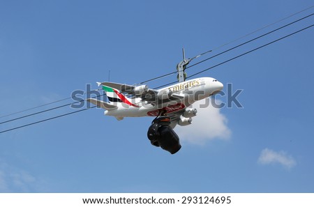 PARIS, FRANCE- MAY 24, 2015: The Cablecam aerial camera system equipped with a replica of an A380 in the colors of Emirates Airlines used for broadcast at Le Stade Roland Garros in Paris