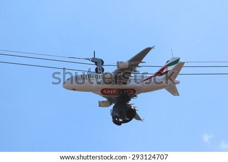 PARIS, FRANCE- MAY 24, 2015: The Cablecam aerial camera system equipped with a replica of an A380 in the colors of Emirates Airlines used for broadcast at Le Stade Roland Garros in Paris