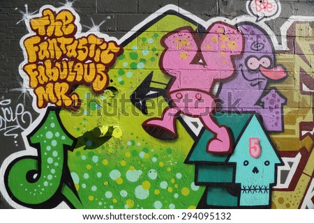 NEW YORK - JUNE 6, 2015: Graffiti art at East Williamsburg in Brooklyn.Outdoor art gallery known as the Bushwick Collective has most diverse collection of street art in Brooklyn