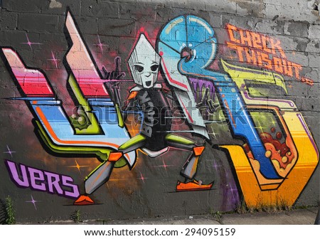NEW YORK - JUNE 6, 2015: Graffiti art at East Williamsburg in Brooklyn.Outdoor art gallery known as the Bushwick Collective has most diverse collection of street art in Brooklyn