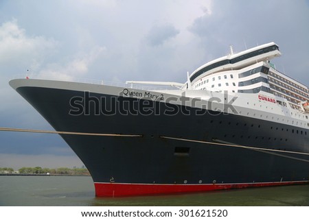 NEW YORK - JULY 30, 2015: Queen Mary 2 cruise ship docked at Brooklyn Cruise Terminal. Queen Mary 2 is Cunard s flagship