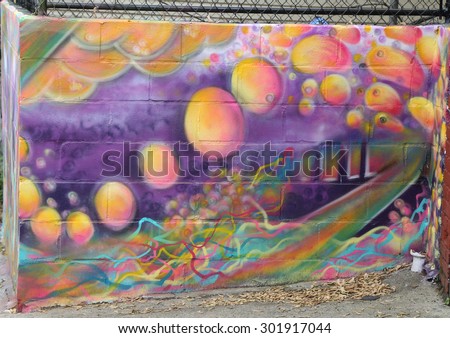 NEW YORK - MAY 21, 2015: Mural art at Centre-fuge Project in Staten Island, NY. A mural is any piece of artwork painted or applied directly on a wall, ceiling or other large permanent surface