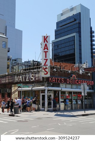 NEW YORK - JULY 16, 2015: Long line in the front of the historical Katz\'s Delicatessen (est. 1888), a famous restaurant, known for its Pastrami sandwiches in Lower East Side in Manhattan