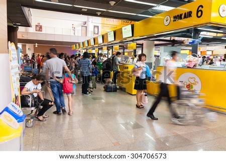 Bangkok - August 6: Don Muang Airport on August 6, 2015 the number of people waiting to board a flight documentation. Are available at Don Muang Airport in Bangkok, Thailand.