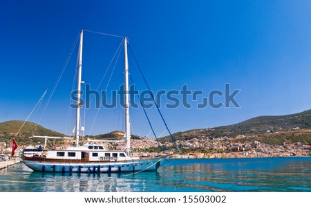 Yacht in a sea by Mediterranean beach. Samos Island, Greece.